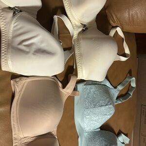 4 36DD lightly padded Bras. Gently worn. Take all 4 30.00 or 15.00 ea